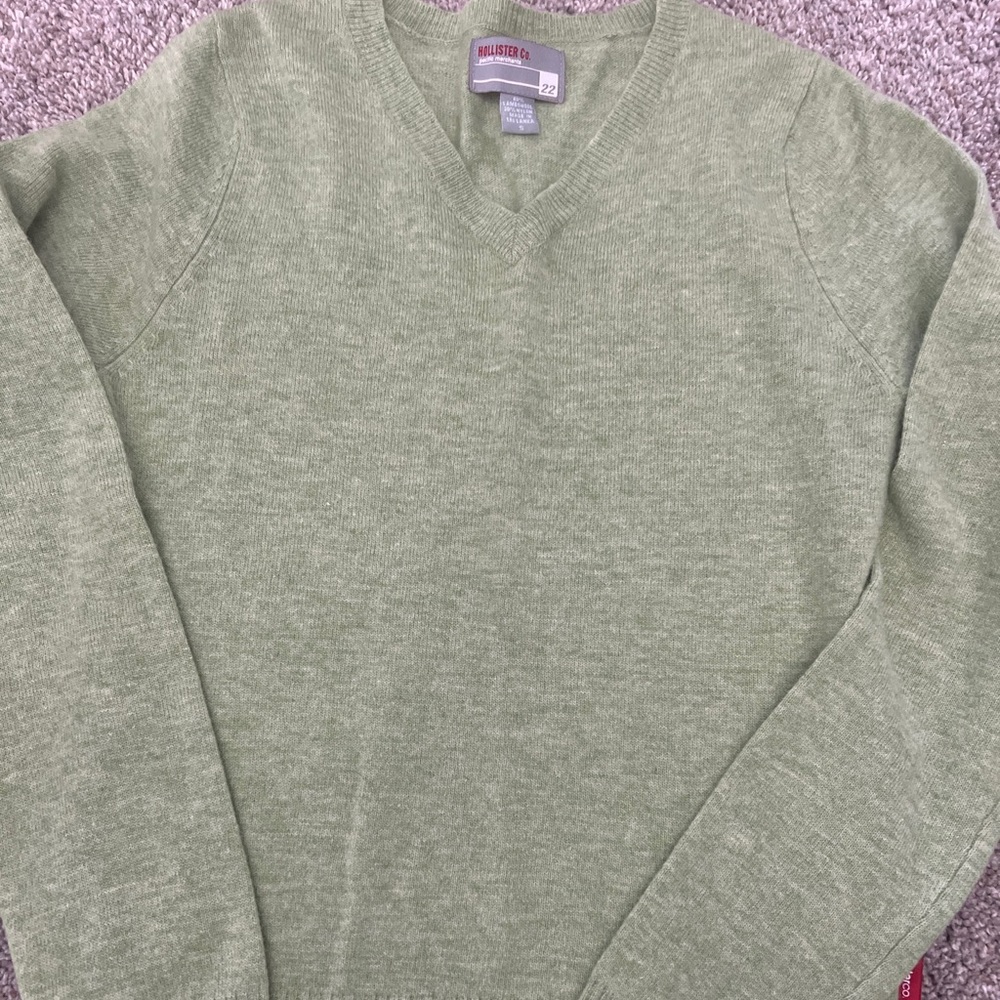 Hollister size small green v neck sweater.